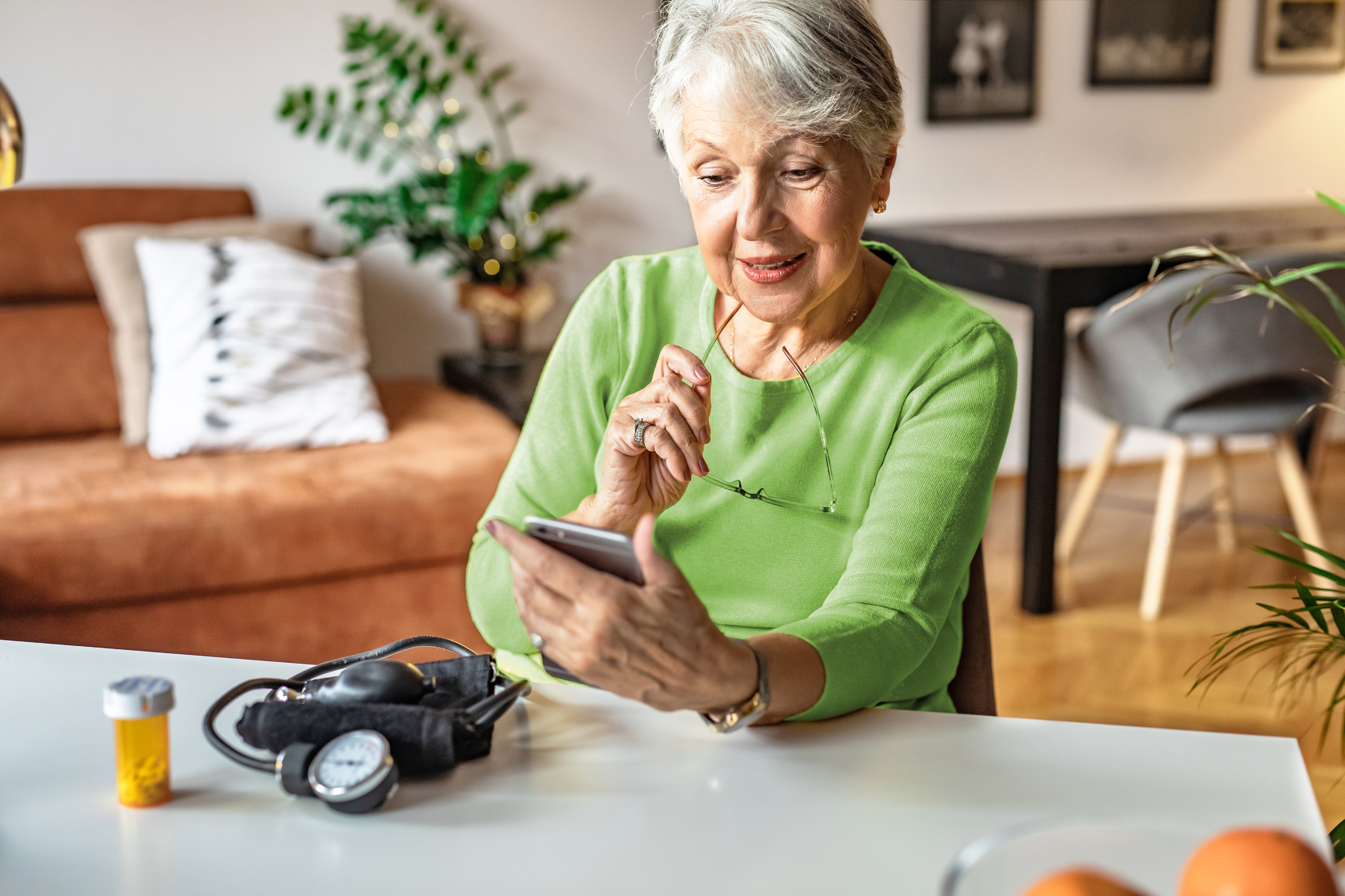GettyImages-1306540406-Patient_Looking_at_Phone-RET